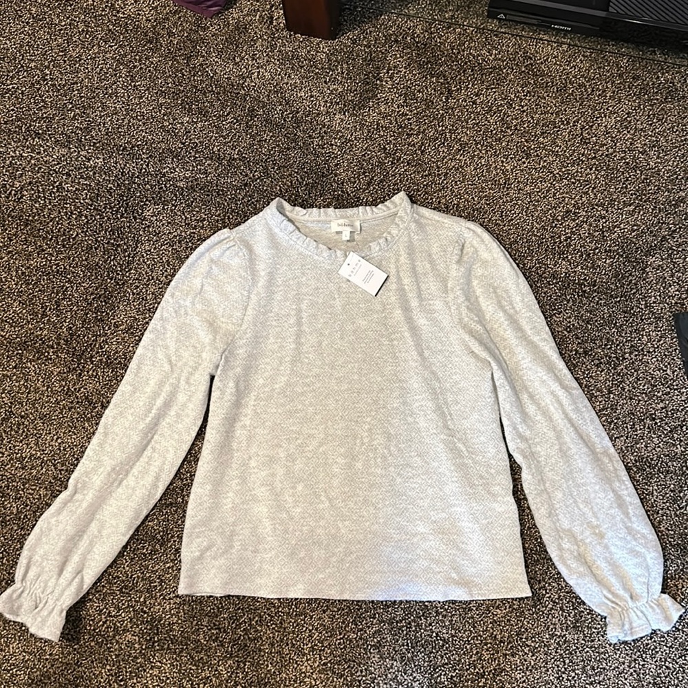 Long sleeved ruffle top